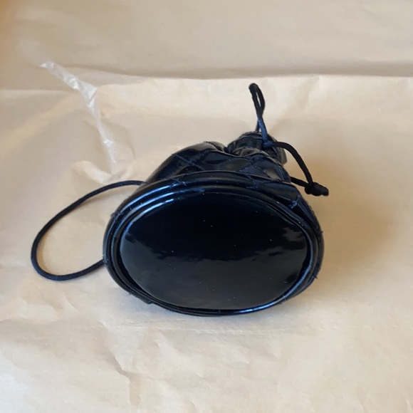 11:01  - 3/$25 Bundle Only GUESS Patent Drawstring Pouch - Picture 7 of 11